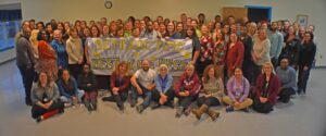 Staff of Benedictine pose with Best of the Best banner.